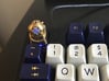 Diver Helmet (For Cherry MX Keycap) 3d printed The diver helmet in polished brass with the frosted skull lit up blue inside