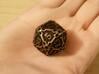 Large Premier d20 3d printed In antique bronze glossy and inked.
