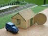 Corrugated Iron Shed 2mm/ft 1/152 (N scale) 3d printed Painted model, with Ratio etched brass window frames fitted. Bachmann vehicle and one pound coin included to indicate size.