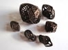 Twisty Spindle Dice Set 3d printed In Polished Bronze Steel