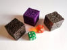 Labyrinthine d6 3d printed A size comparison of the die in polished bronze steel, purple strong and flexible, and stainless steel with normal dice