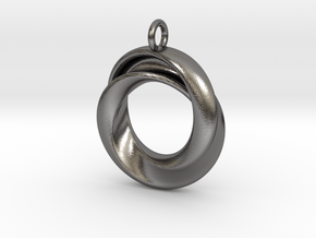 A Torus with a twist in Polished Nickel Steel