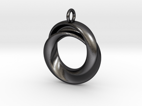 A Torus with a twist in Polished and Bronzed Black Steel