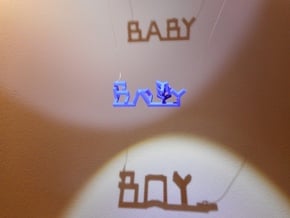 Baby Boy in Blue Processed Versatile Plastic