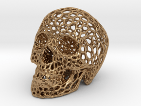 Human skull skeleton perforated sculpture in Polished Brass