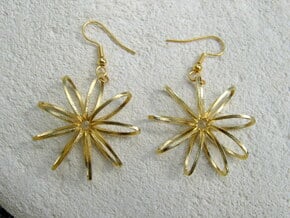 Nine Moebius Star Earrings in Natural Brass