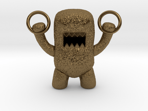 Domo Monster doing exercises with rings in Polished Bronze