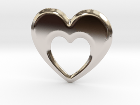 Heart within a heart pendant  in Rhodium Plated Brass