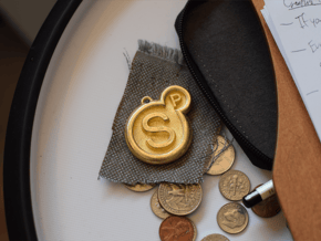 Surreal Products Logo Keychain in Polished Gold Steel