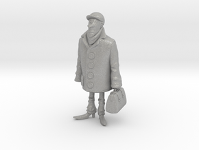 Man holding a suitcase in Aluminum