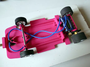 Slot car chassis for FXX 1/28 in Pink Processed Versatile Plastic