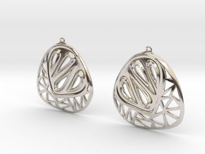Organic and angular earrings in Platinum