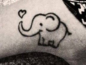 Elephant love tattoo in Tan Fine Detail Plastic