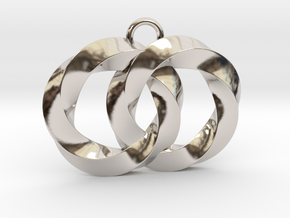 Twisting Planets Pendant  in Rhodium Plated Brass