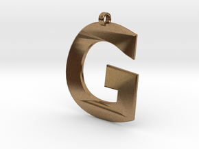 Distorted letter G in Natural Brass