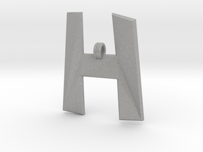 Distorted letter H in Aluminum