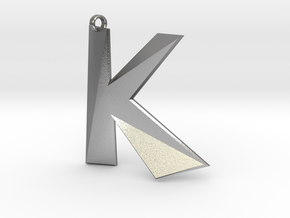 Distorted letter K in Natural Silver
