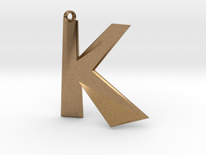 Distorted letter K in Natural Brass