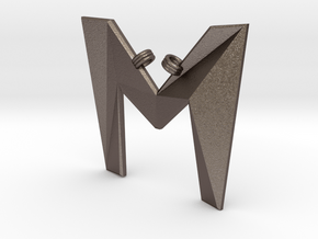 Distorted letter M in Polished Bronzed Silver Steel