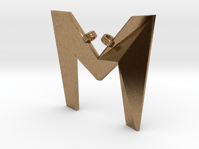 Distorted letter M in Natural Brass
