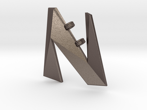 Distorted letter N in Polished Bronzed Silver Steel