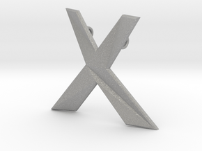 Distorted letter X in Aluminum