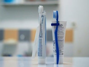 Tooth Brush Clip in Blue Processed Versatile Plastic