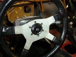 MOMO Steering wheel adapter for Celica Emblem in Black Natural Versatile Plastic