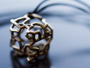 Stylized cube with an organic design in Polished Bronzed Silver Steel