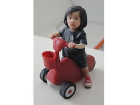 Scanned Little Girl rides a toy car - 8CM High in Full Color Sandstone