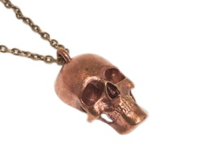Human skull pendant - 30 mm in Natural Bronze