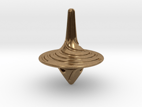 spinning top in Natural Brass