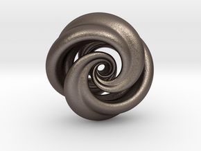 Integrable Flow (7, 2) in Polished Bronzed Silver Steel