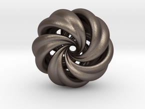 Integrable Flow (7, 5) in Polished Bronzed Silver Steel