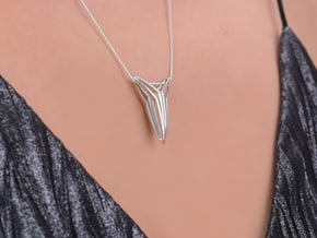 YOUNIVERSAL FIGURA Pendant. Sculpted Chic in Polished Silver