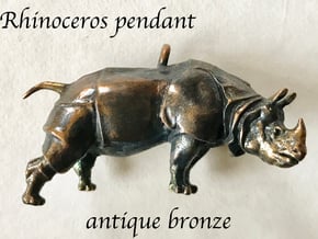 Rhinoceros Pendant in Natural Bronze