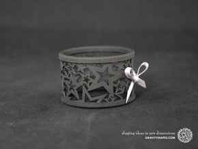 A large Christmas napkin ring with Stars in Black Natural Versatile Plastic