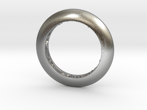 Ring shaped pendant with a raw band inside in Natural Silver