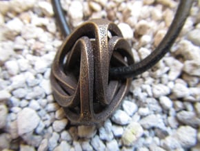 Intertwined Tetrahedra in Polished Bronze Steel
