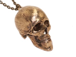 Human Skull With Loop in Natural Brass