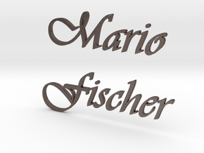 Mario-Fischer-Schriftzug in Polished Bronzed-Silver Steel