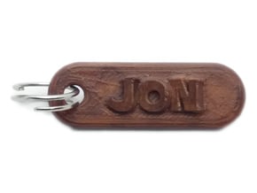 JON Personalized keychain embossed letters in White Natural Versatile Plastic