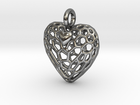 Caged Heart Escaping in Polished Silver