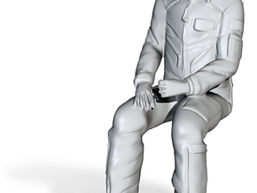 Pilot 01 seated pose .1:35 Scale in Tan Fine Detail Plastic
