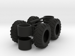 1/64th Log Skidder Tires, regular stock size in Black Natural Versatile Plastic
