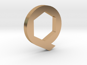 The Q in Polished Bronze