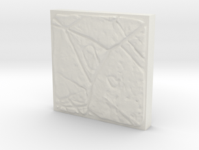 A single unique dungeon tile (3cm x 3cm) in White Natural Versatile Plastic