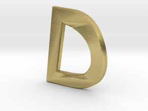Distorted letter D no rings in Natural Brass