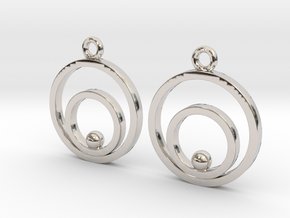 Circles and ball in Rhodium Plated Brass