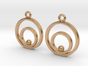 Circles and ball in Polished Bronze